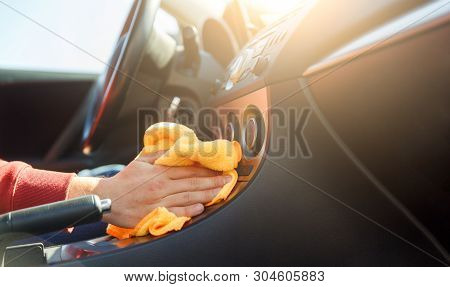 Photo Of Human Hand With Orange Cloth Washing Carinterior, Close-up
