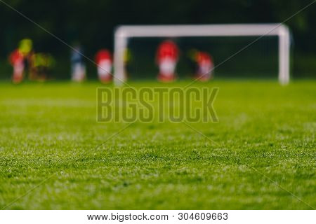 Football Soccer Field. Low Angle Image Of Green Turf On Soccer Pitch