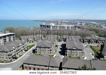 An Aria View Of Some Big Development With New Houses And Condo
Buildings On The Shore Of Lake Ontari