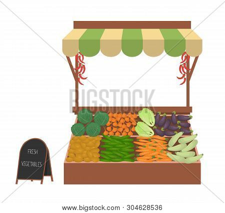 Tray With Vegetables On The Market. Workplace Of The Market Seller. There Is Scales And Goods: Cucum