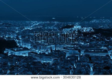 Athens skyline at night viewed from Mt Lykavitos with Acropolis, Greece.