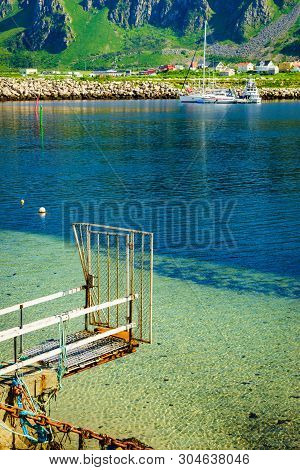Fishing Port Old Pier And Gate With Bleik Village Houses In The Background. Andoya Island, Vesterale