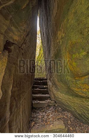 Narrow Passage On A Trail Between Sandstone Rocks On The Rim  Rock National Recreational Trail In Sh