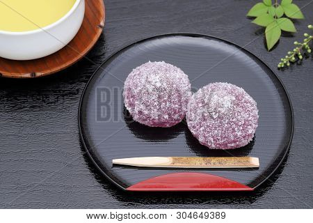 Japanese Traditional Confectionery, Red Bean Jelly Yokan On Black Background