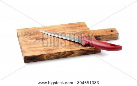Stainless Steel Boning Knife With Plastic Handle On Board Against White Background