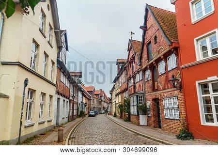Luneburg, Germany - November 04, 2018: Street With Medieval Old Brick Buildings In Luneburg