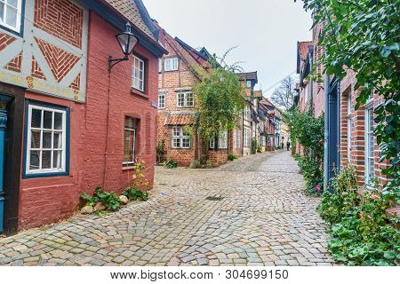 Luneburg, Germany - November 04, 2018: Street With Medieval Old Brick Buildings In Luneburg