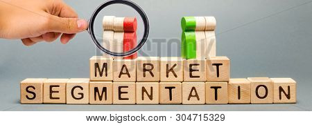 Wooden Blocks With The Word Market Segmentation And Multicolored Groups Of People. Target Audience, 