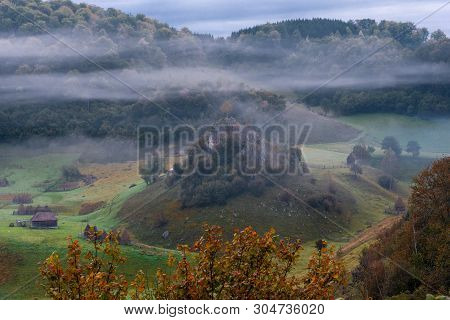 Cold Misty Morning In Stunning Remote Location, Fundatura Ponorului Village, Romania