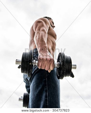 Healthy Lifestyle. Athletic Body. Dumbbell Gym. Fitness And Sport Equipment. Man Sportsman Weightlif