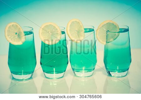 Woodruff Soda In Front Of Blue Background