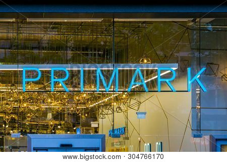 Lighted Primark Neon Sign At The Shopping Window, Exterior Of The Primark Store In Antwerp, Antwerpe