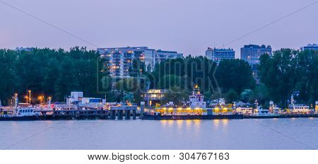 Zeescouts Building With Many Lighted Boats In The Evening At The Harbor Of Antwerp City, Antwerpen, 