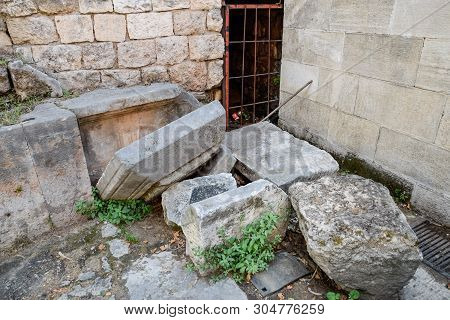 Stones At The Entrance To The Inside Of The Building At The Gates Of Hadrian. Adrian Gate, Antalya L