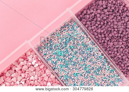 Colorful Assorted Nonpareils Cake Candy Sprinkles In Three Rectangular Bowls On Pink Background In F