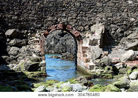 Archway In Sea Wall At Portpatrick Harbour Scotland