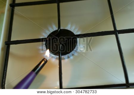 Gas Burning In The Burner Of Gas Oven. Ignite The Gas Lighter Gas Burner Stove