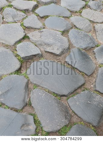 Stones Of A Antique Roman Road In Rome