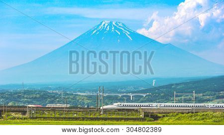 2017 May 31. Shizuoka Japan. Running High Speed Train Tokaido Shinkansen And Fuji Mountain With Rice