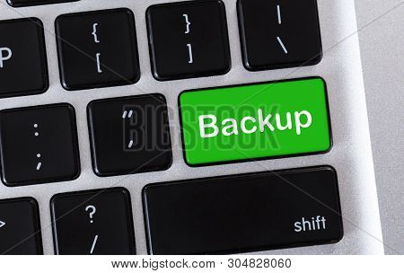 Saving Data. Backup Green Button On Computer Keyboard