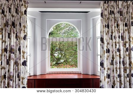 Refreshing Greenaries, Nature View From Home Interior Through Glass Window In  Tropical Highlands