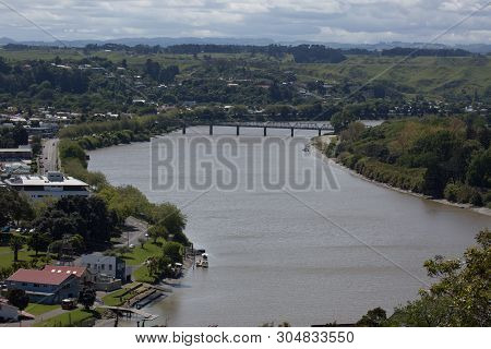 A Long Concrete Bridge Spanning The River In Whanganui