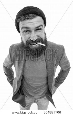 Hipster Brutal Bearded Tobacco Smoker. Brutality And Masculinity. Brutal Unshaven Guy Smoking White 