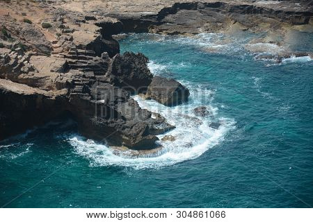 Rosh Hanikra. Israel. Sea Waves And White Rock. A Unique Tourist Attraction Located On The North-wes