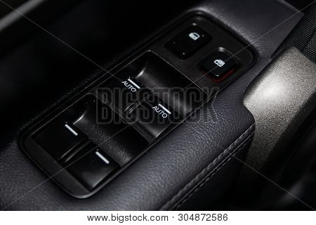 Novosibirsk, Russia - June 04, 2019:  Honda Cr-v, Close-up Of The Side Door Buttons: Window Adjustme