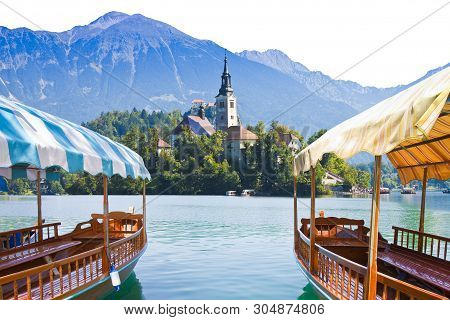 Typical Wooden Boats, In Slovenian Called Pletna, In The Lake Bled, The Most Famous Lake In Slovenia