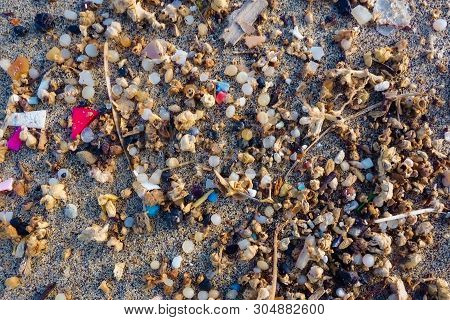 Microplastics Found On The Shore Of A Beach In Lanzarote. Sea Pollution By Plastic, Canary Islands