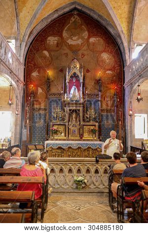 Rocamadour, France - September 3, 2018: The Black Madonna In The Chapel Of Our Lady At  Basilica Of 