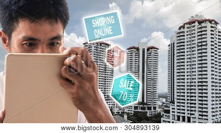 Man Holding Tablet For Blurred Bokeh Background E-shopping Marketing Digital, Consumer Purchase Shop