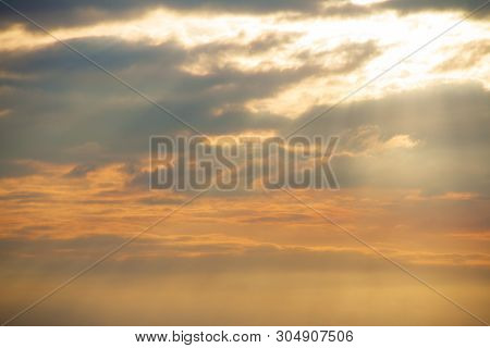 Evening Weather, Golden Cloud And Sky With Sun Light Are Shone Through The Clouds Look Feel Good.