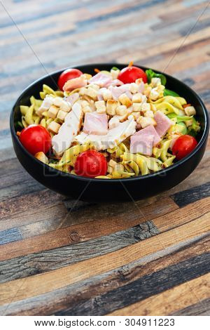 cereal specialties cooked with salad, roasted chicken aiguillette cured with salted and bacon