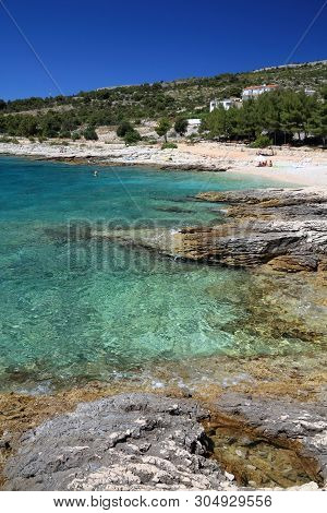 Croatia Coast Landscape In Dalmatia. Dolac Beach - Adriatic Sea.