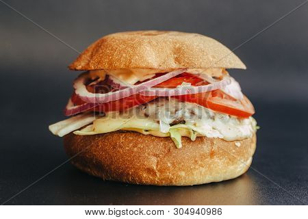 Burger Flyer. Cheese Burger With Grilled Meat, Cheese, Salad And Onion Rings. Close-up Of Delicious 