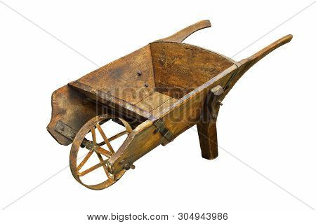 Historic Hamdmade Wheelbarrow Isolated Over White Background; Thie Is A Rare Barrow Made Of Wood