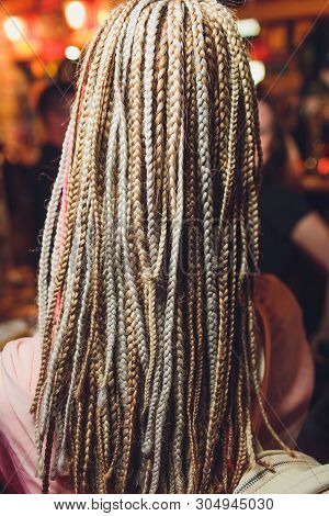 Texture Of Thin Brown Pigtails, Afro Style.
