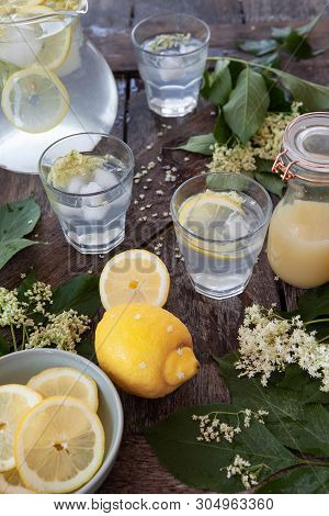 Homemade Lemonade Made With Elderflower Sirup And Slices Of Lemon