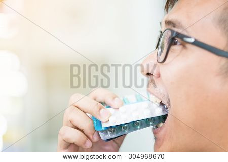 Young Male Taking Many Pills In Hand.dramatic Moment, Man Taking A Lof Of Pills For His Depression