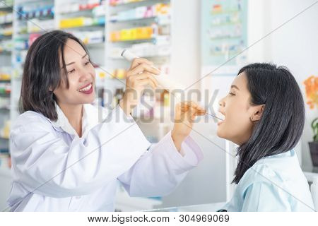 Doctor Checking A Patient's Mouth