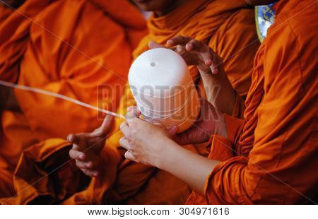 Thai Buddhist Monks Praying In Temple At Buddhist Temple Holding Sacred Cord Or Holy Thread Press Th