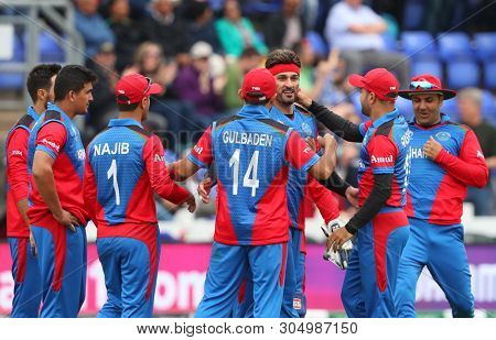 CARDIFF, WALES. 04 JUNE 2019: Hamid Hasan of Afghanistan celebrates taking the wicket of Dhananjaya de Silva of Sri Lanka during the Afghanistan v Sri Lanka, ICC Cricket World Cup match