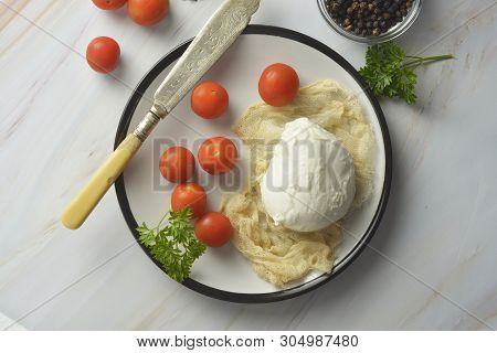 Mozzarella Cheese And Cherry Tomatoes With Spices. Homemade Mozzarella Cheese, Isolated.