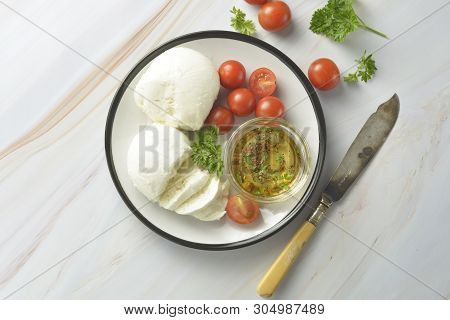 Mozzarella Cheese And Cherry Tomatoes With Spices. Homemade Mozzarella Cheese, Isolated.
