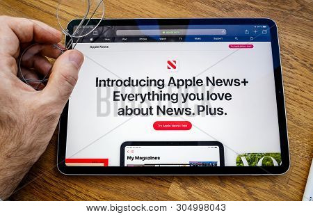 Paris, France - Mar 27, 2019: Pov Personal Perspective On Apple News Webpage Seen On Modern Ipad Pro