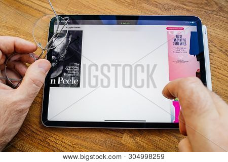 Paris, France - Mar 27, 2019: Pov Personal Perspective On Apple Webpage Seen On Modern Ipad Pro Tabl