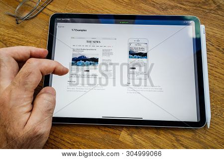 Paris, France - Mar 27, 2019: Pov Personal Perspective On Apple News Webpage Seen On Modern Ipad Pro