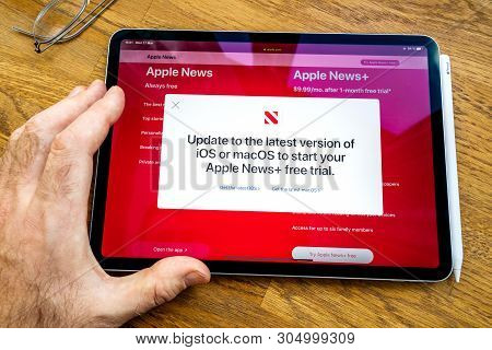 Paris, France - Mar 27, 2019: Pov Personal Perspective On Apple News Webpage Seen On Modern Ipad Pro